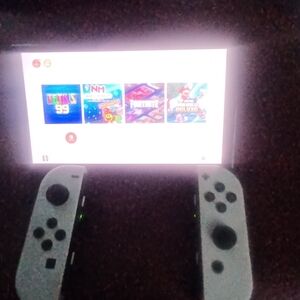 Nintendo Switch with White Joy-Con Controllers